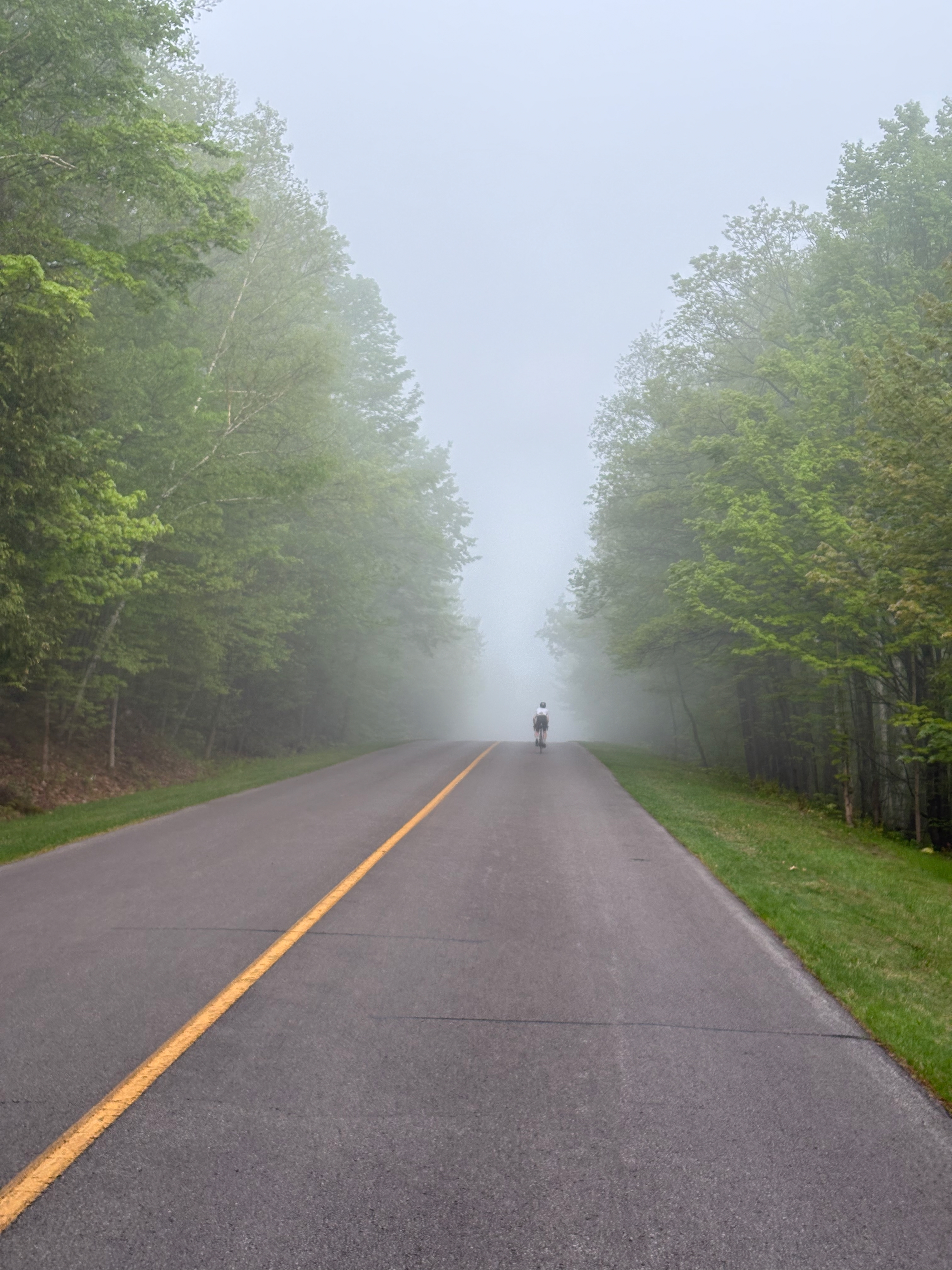 A cyclist climbing up to Pink Lake